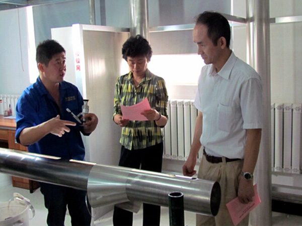 国家外专局来访我司并展开现场指导学习公作